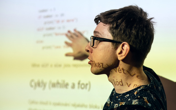 Python course instructor in front of the projector